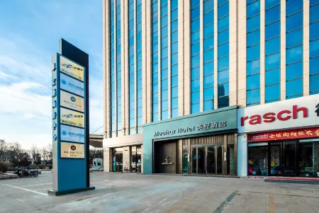 Mechar Hotel(Jiexiu Hongshun Business Center) Отели в г. Цзесю
