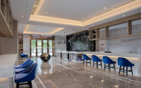 Kyriad Marvelous Hotel Shenzhen Longgang Dayun City Center Отели рядом с достопримечательностью «Shenzhen Fenghuangshan National Mining Park»