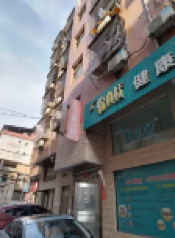 Tongxiang Huxing Apartment (Runda International Branch)