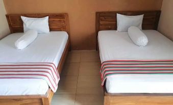 Hotel Gloria Borong Mitra RedDoorz