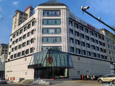 Tiger Hotel Отели рядом со станцией Dunhua Railway Station