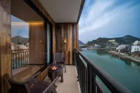 Mengluo Xinghe Hotel Hôtels à : Xiushan County