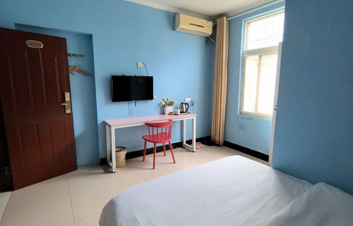 Xinyang Wanjia Hotel