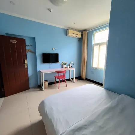 Xinyang Wanjia Hotel