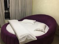 重庆紫琪公寓 - 紫芯圆床主题房