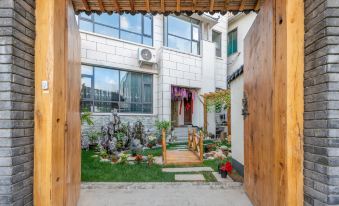 Laojunshan Guojia Family House Homestay