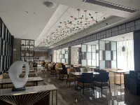 Kelly Hotel (Zhijiang Seven Star Plaza International Trade Shop) - فطور