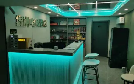 Tongchuan Oasis E-sports Hotel Отели в г. Тунчуань