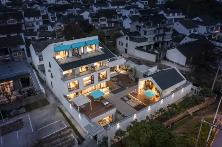 Miss Gu's Boutique Homestay Отели рядом с достопримечательностью «Shanghai Customs College Suzhou Branch»