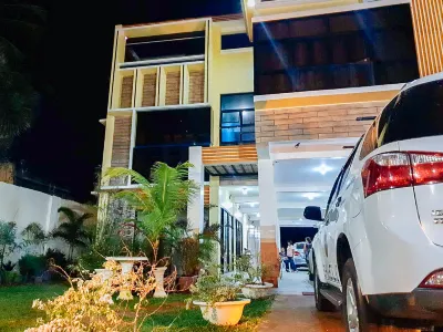 RedDoorz near SGM Condotel Villa Beach Iloilo Hôtels à : Tigbauan