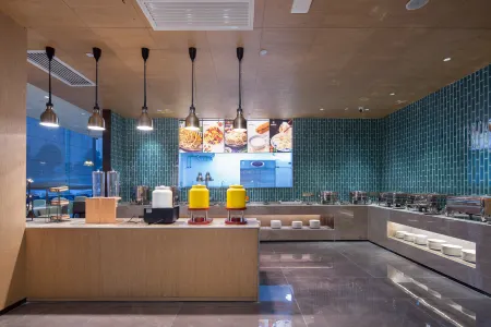 Huichen  Hotel Отели рядом с достопримечательностью «Xie Zilong Photography Museum»