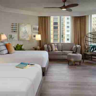Pelican Grand Beach Resort, a Noble House Resort Rooms