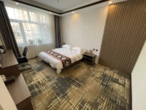 Yongxin Business Hotel โรงแรมในไถ้หลาย