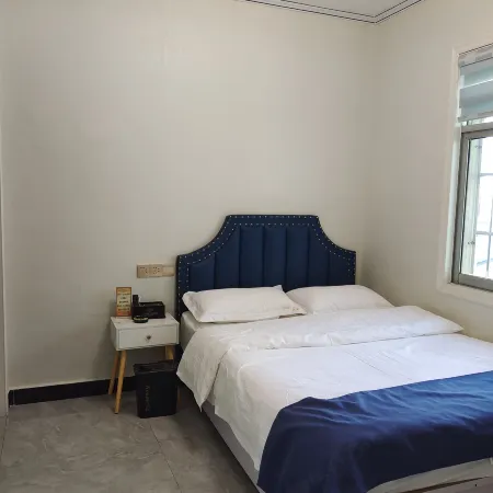 Neixiang Wangjia Business Express Hotel