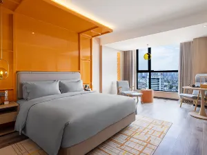 Hanzhong Central Square High Speed Railway Station Renjoy Hotel