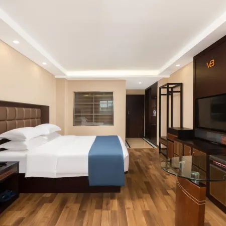 Xiushan V8 Boutique Hotel (Xiushan Railway Station Branch)