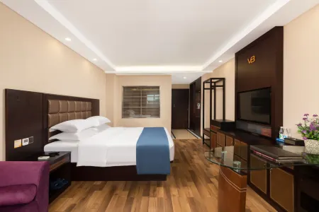 Xiushan V8 Boutique Hotel (Xiushan Railway Station Branch)