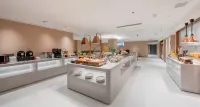 โรงแรมเปโร (ใกล้ดิสนีย์แลนด์ พร้อมรถรับส่งฟรีไปยังสนามบินปู่ตง) - พร้อมอาหารเช้า