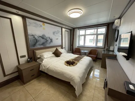 Mishan Zheli Qianyong Hotel Отели рядом со станцией Mishan Railway Station