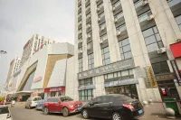 Kaichun Homestay (Mudanjiang Wanda Plaza)