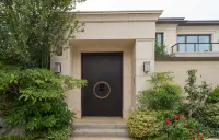 臨沂桃花歸嶼民宿 山東城市服務技師學院(魯州學院)附近的飯店