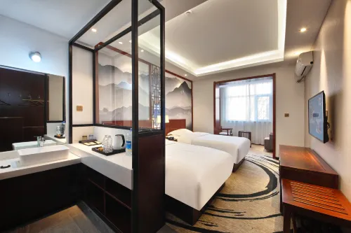 Aichenshi Hotel (Baoding Tianxia Baobai Shopping Plaza)
