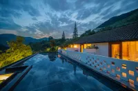 Anji Yieryi. Coco Garden Homestay Hotels in Hello Kitty Park