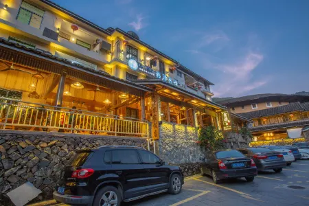 Xinyuan Inn Отели рядом с достопримечательностью «Taxia Scenic Spot, Tulou Nanjing Scenic Area»