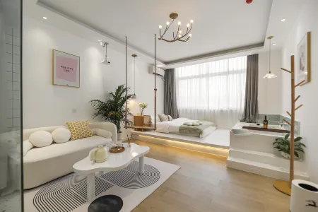 Qianxun Designer Homestay (Dengzhou Guangyi Sleepless City Branch) Отели рядом с достопримечательностью «Nanyang Vocational College of Science and Technology»