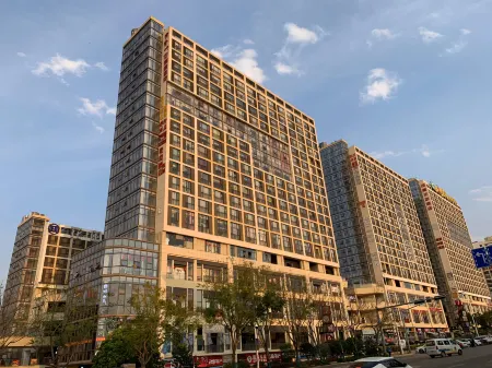 Vi Home Hotel Отели рядом с достопримечательностью «Kunming University of Technology Chenggong Campus College of Mechanical and Electrical Engineering»