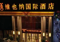 Vienna International Hotel (Xinyang Railway Station Tianrun Plaza Store) Hotel in zona Xinyang Railway Station
