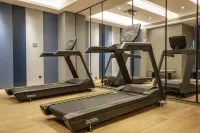 DeXin JunTing Hotel (Wenzhou South Railway Station Yintai Department Store Branch)