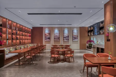 H'elite International Hotel (Zhuhai Couple North Road Sun Yat sen University Store) Отели рядом с достопримечательностью «Zhuhai Branch of Beijing Normal University Dormitory»