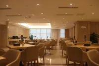 Vienna Hotel (Xingren Hotel) - servizio colazione