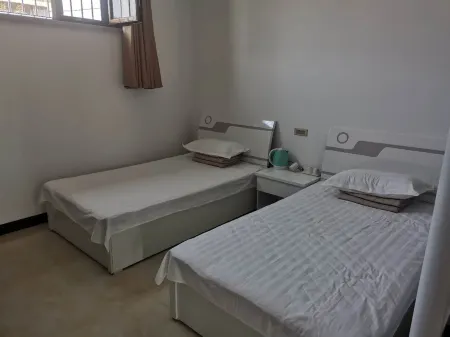 Jiaocheng Xiyingli New Hotel Отели рядом с достопримечательностью «Hexagrams Mountain»