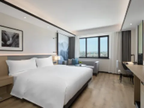 Modern Four Seasons Hotel (Xinhuijia Branch) Hotels in Korla