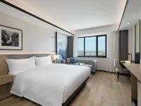 Modern Four Seasons Hotel (Xinhuijia Branch) Hotels near Violet Folk Custom Garden