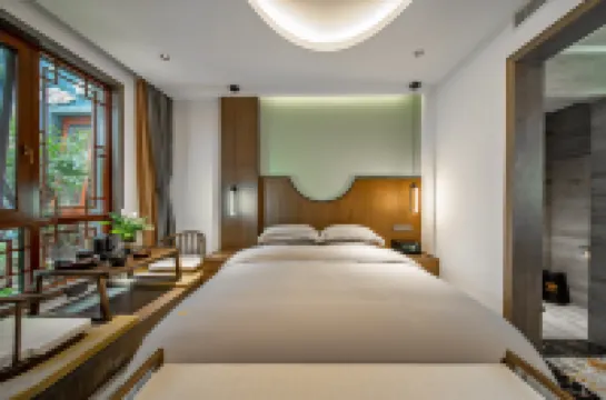 Lijiang Yixin Famous Products Inn (Dashuiche Branch)