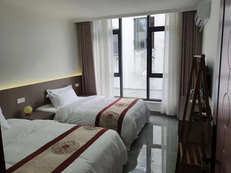 Yuanfu Homestay Отели в г. Даи