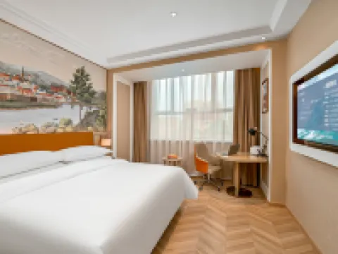 Vienna Hotel (Cele) Hotels in Qira