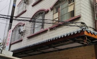 Longsheng Xinji Hotel - Housity