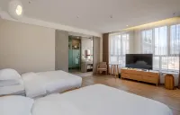 Kanas DeRong Hotel Hotel dekat Hemu