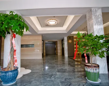 Magnotel Hotel (Huanggang Xishui Wen Yiduo Avenue) Отели в г. Сишуй