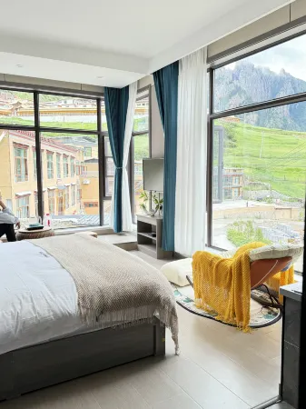 Agong Homestay (Zagana Scenic Area) Отели в г. Диебу