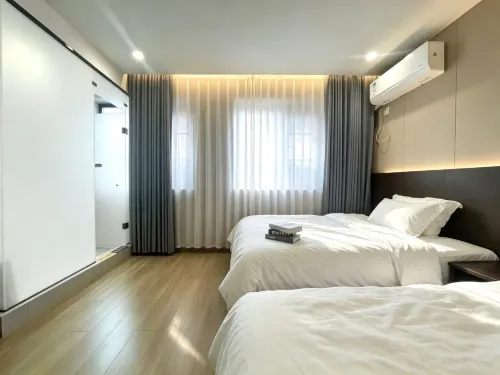 Damei Homestay (Kaifeng Wansui Mountain Wuxia City Millennium City Park) - خدمة نقل من وإلى المطار
