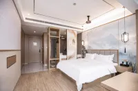 โรงแรมชิงมุ (สถานีรถไฟความเร็วสูงอี้ซิง)