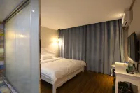 Zhan'en Yiju Hotel (Shangqiu Wanda Plaza) - Inns