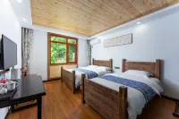 Floral Hotel · Mountain Whisper Hotel（Shennongjia Wooden fish store） Hôtels à : Shennongjia