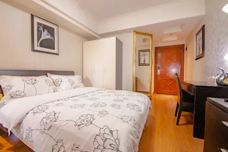 Xinjia Business Apartment Hotel