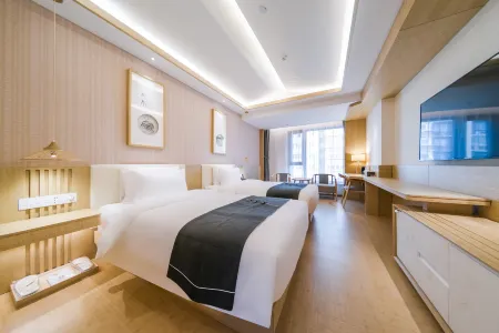 Jianguo Puyin Hotel (Xi'an Big Wild Goose Pagoda University of Technology  Subway Station Branch) Отели рядом с достопримечательностью «Xi'an University of Technology (West Area)»